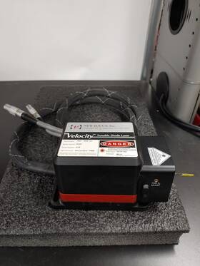 963-999 New Focus 6209 6321 Nm Wavelength Velocity Tunable Diode Laser With