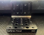 New Focus 9101 M6 Thru Slots M4 And Threads Angle Plate Optics. Fixed Price $50.00.