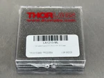 Thorlabs LA1213-ML Plano-convex Lens N-BK7 Mounted Uncoated 1/2". Fixed Price $19.51.