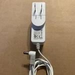 Genuine Spectra Switching Power Adapter UES24LCP-120200SPA Output: 12V 2.0A. Fixed Price $16.01.