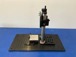 14900 Melles Griot 1/4 20 Board W/ Xyz Height Travel 10.5" About 3/4" On Other. Fixed Price $550.00.
