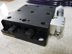 Melles Griot Square Carriage Rail Table Slide W/ Micrometer Head. Fixed Price $100.00.