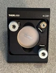Thorlabs KCB1 Right-angle Kinematic Mirror Mount With PF10-03-P01. Fixed Price $110.00.